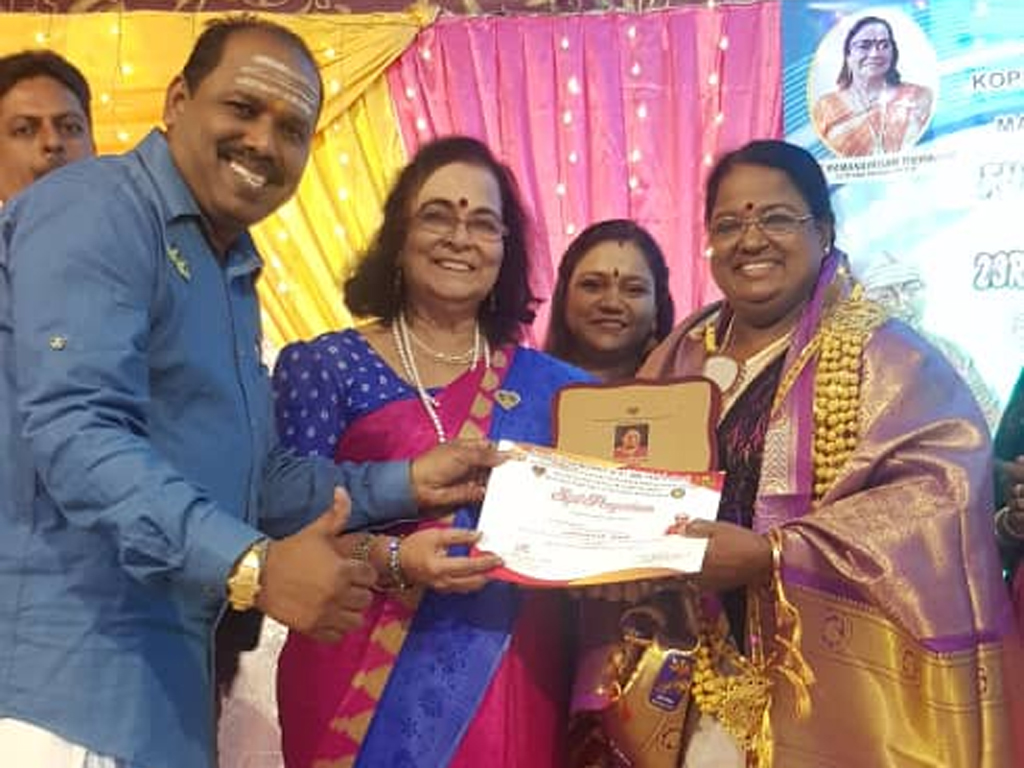 Smt. Kumari.S.Nair, Chairperson being honoured with SEVA RATNA International Award